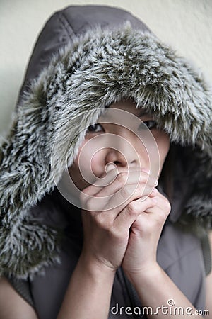 asian-girl-feeling-cold-9257519.jpg